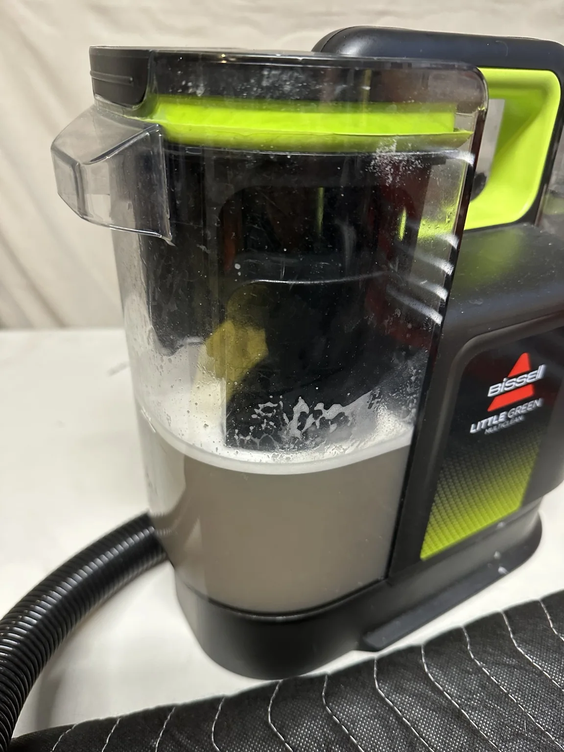 Cleaning extractor after car seat cleaning